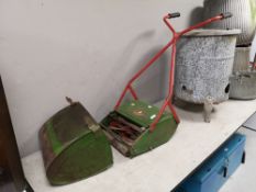 A vintage qualcast push along mower