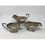 Three silver sauce boats by Walker & Hall,