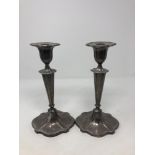 A pair of loaded silver candlesticks, Walker & Hall, Sheffield, with sconces, height 23.5cm.