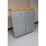 A beech and grey office storage cabinet