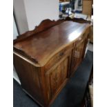 A nineteenth century mahogany sideboard