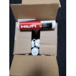 A box of Hilti white fire stop acrylic sealant