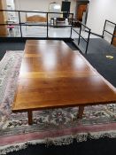 A reproduction extending dining table