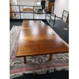 A reproduction extending dining table