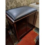 An antique storage stool