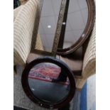 Two Edwardian mirrors together with a brass mirror