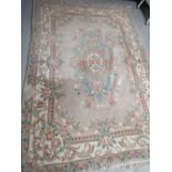 A fringed Chinese carpet,