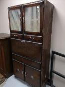 A mid century kitchen cabinet