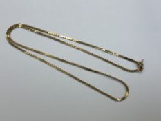 A 9ct gold flat link necklace, length 54cm CONDITION REPORT: 6.