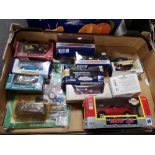 A box of die cast model vehicles,