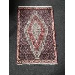 A Tabriz design rug,