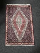 A Tabriz design rug,