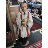A large resin figure - Religious priest