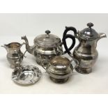 A Lindisfarne silver four piece tea service by Reid & Sons,