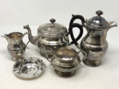 A Lindisfarne silver four piece tea service by Reid & Sons,