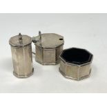 A three piece silver condiment set