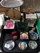 A tray of paperweights, decorative mantle clock,