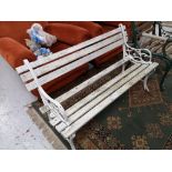 Two wooden benches and a garden chair