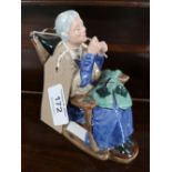 A Royal Doulton figure - A Stitch in Time HN 2352