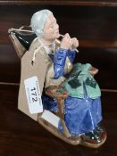 A Royal Doulton figure - A Stitch in Time HN 2352