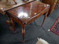 A nineteenth century mahogany tea table