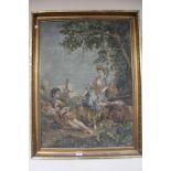 A gilt framed needlework picture - Two figures with cattle