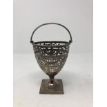 A Georgian silver basket, London marks 1782, height 14.5cm.