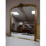 A Victorian style bevelled overmantel mirror CONDITION REPORT: 126cm wide by 132cm