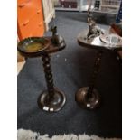 A pair of decorative smoker's stands modelled as dog and fawn