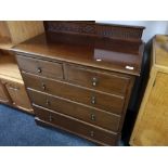 An Edwardian mahogany five drawer chest