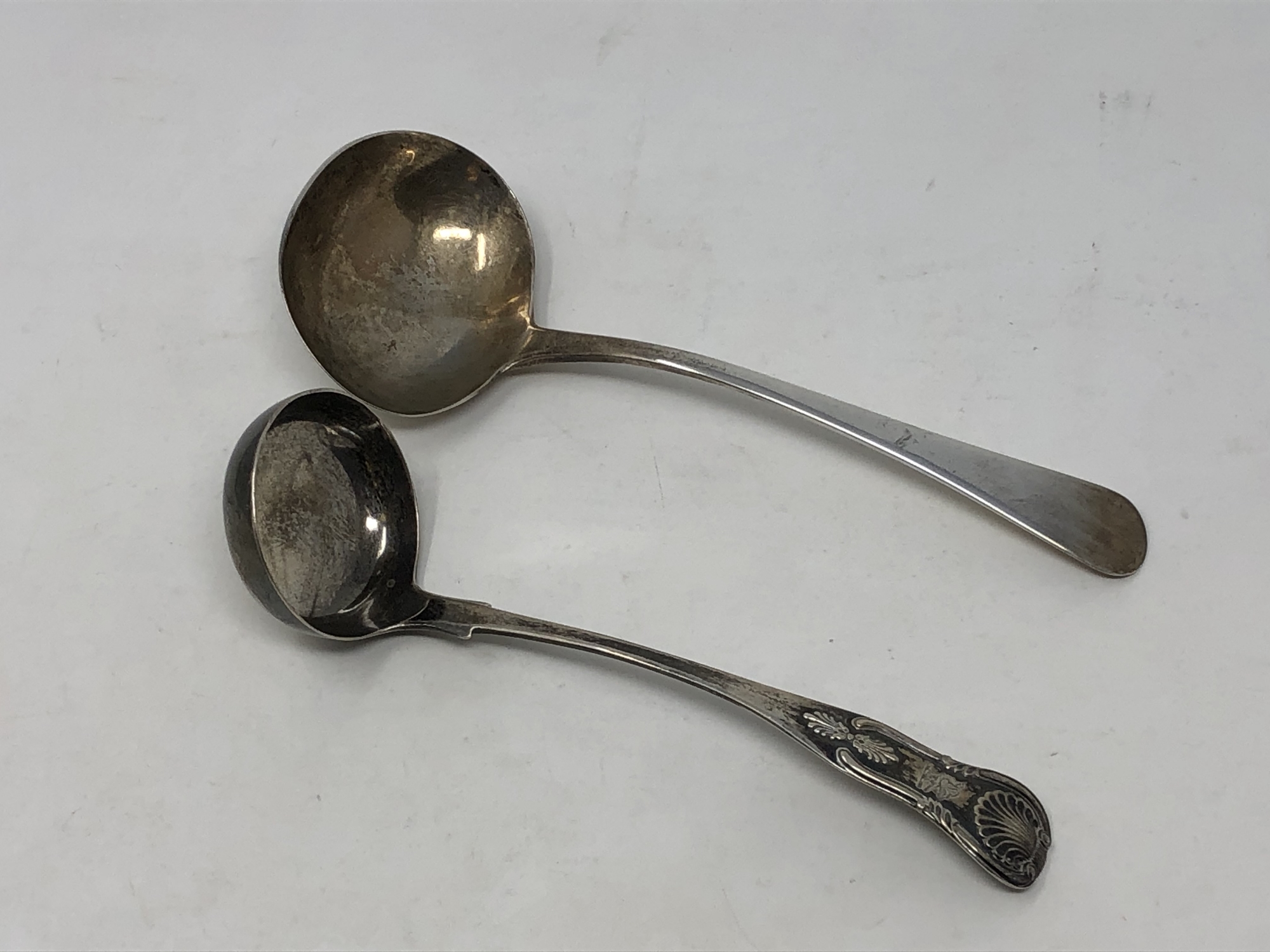 A Georgian silver ladle and a Victorian example (2)