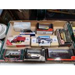 A box of die cast model vehicles,