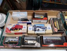 A box of die cast model vehicles,