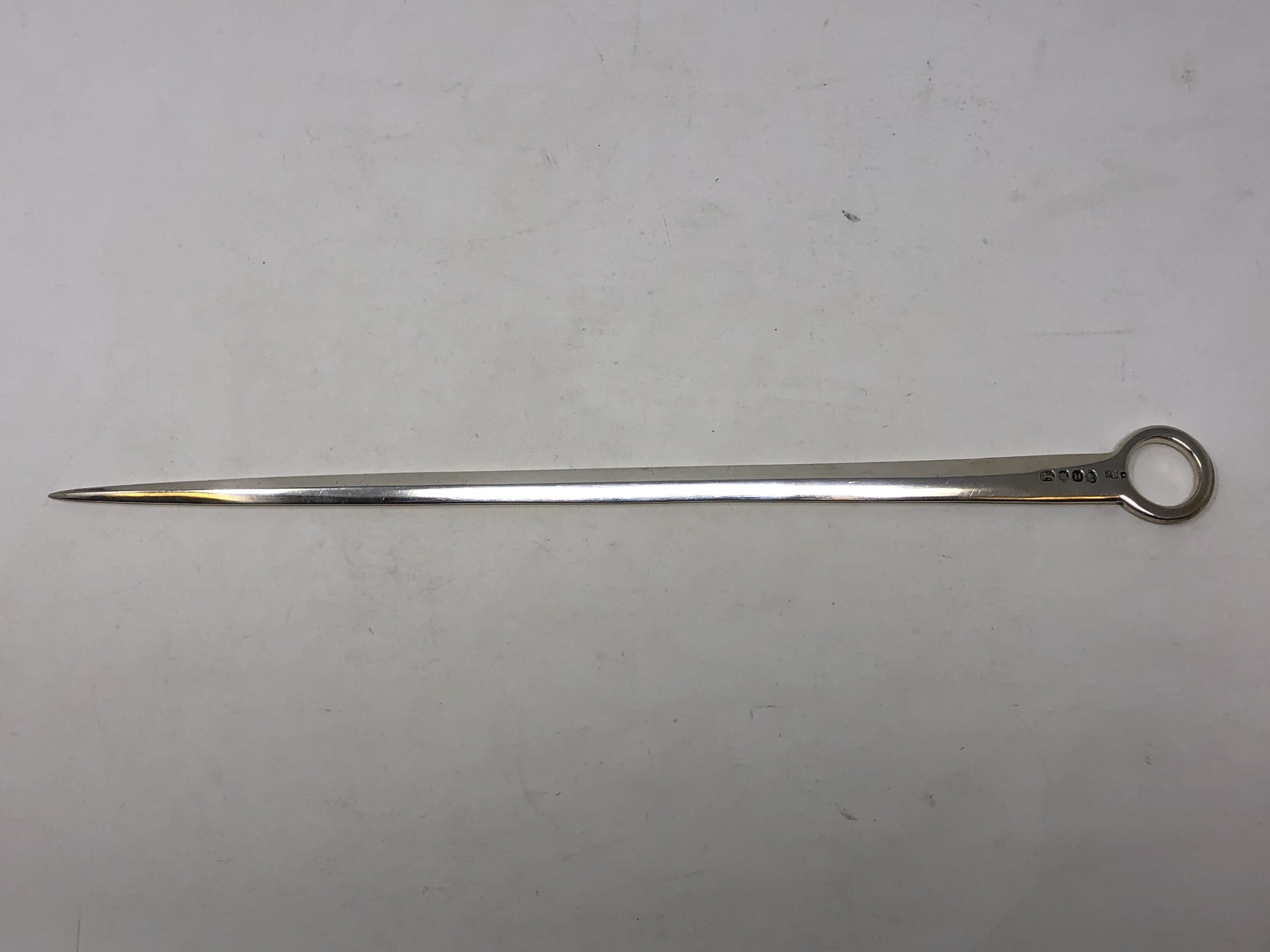 A George III silver meat skewer, maker RC,