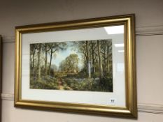 A gilt framed highlighted print - English country landscape