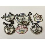 Six Victorian porcelain decanter labels