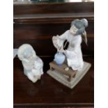 A Lladro figure - Geisha together with a small Lladro figure of a child holding a polar bear