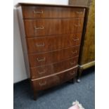 A mid century six drawer beech chest
