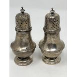 Two silver castors