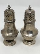 Two silver castors