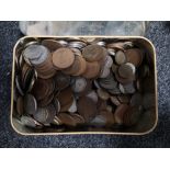 A tin of coins - copper,