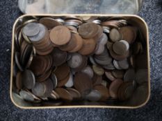 A tin of coins - copper,