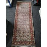 A North West Persian runner 200cm by 76cm