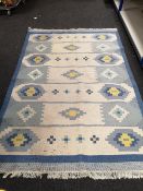 A flatweave rug,