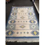 A flatweave rug,