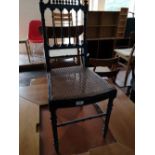 A 19th century bedroom chair with bergere seat.