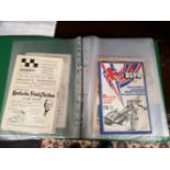 A folder of speedway programmes,