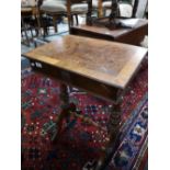 A nineteenth century mahogany work table