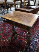 A nineteenth century mahogany work table