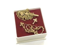 A pair of 9ct gold crucifix earrings,